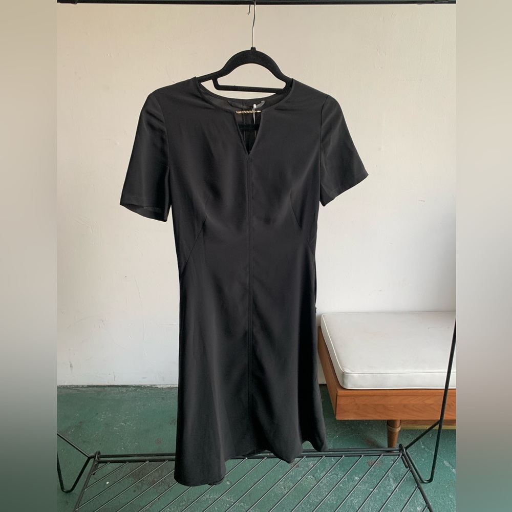 Black cocktail dress with gold accent chain | Goelia NWT